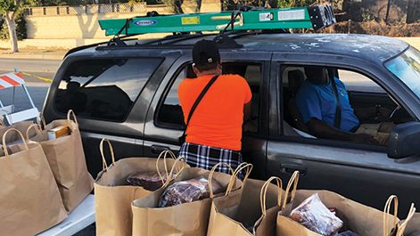 The church is active in community outreach, hosting a quarterly concert, preparing 1,000 grocery bags for Thanksgiving, distributing 500 toys for Christmas, and giving away clothing in the summer.